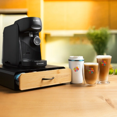 TASSIMO Double Wall Glass Coffee Mug with layered coffee drink.