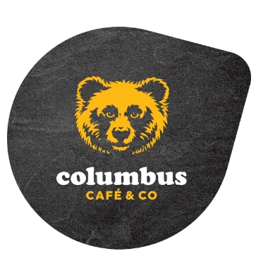 Columbus Café & Co recently updated its logo to feature a charming bear face illustration alongside the TASSIMO name, highlighting their collaboration with the renowned beverage brand.