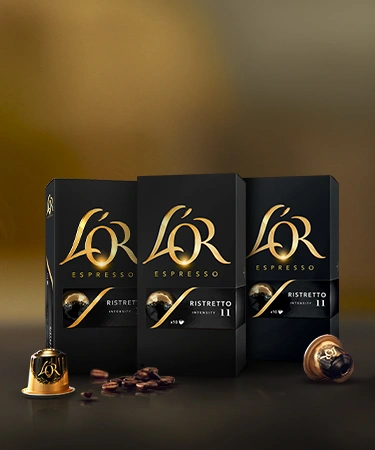 Display of L'OR Espresso coffee pods with descriptions highlighting their flavors.