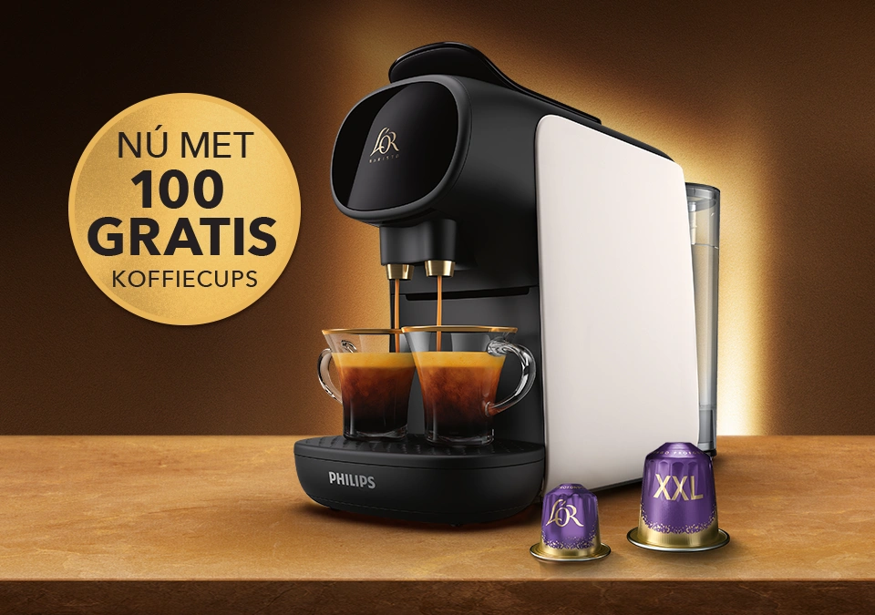 A L'OR BARISTA coffee machine with sticker says: Free 100 coffee capsules