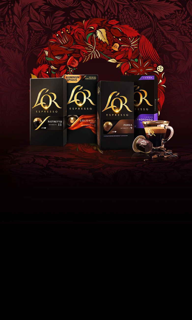 L'OR Ristretto, Colombia, Forza and Profondo packs with coffee cup, capsule and scattered beans on a red wreath background.