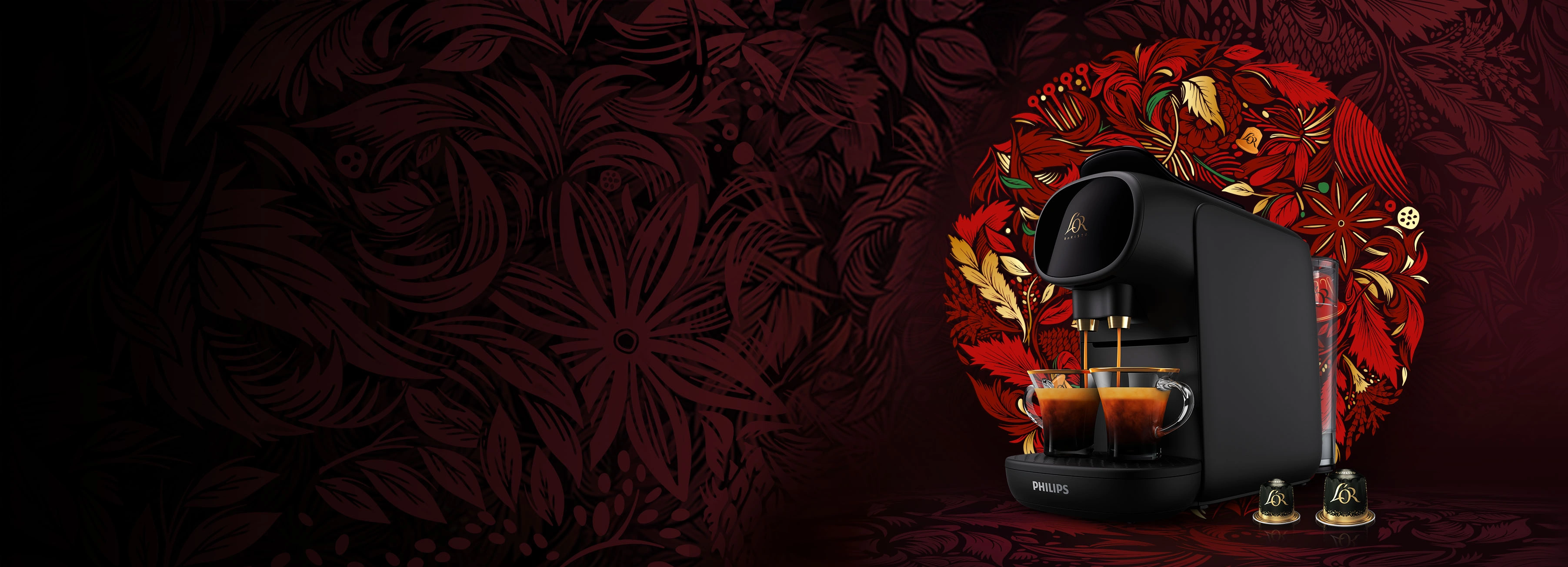 Machine à café noire L’OR Sublime et capsules sur un fond de couronne rouge.