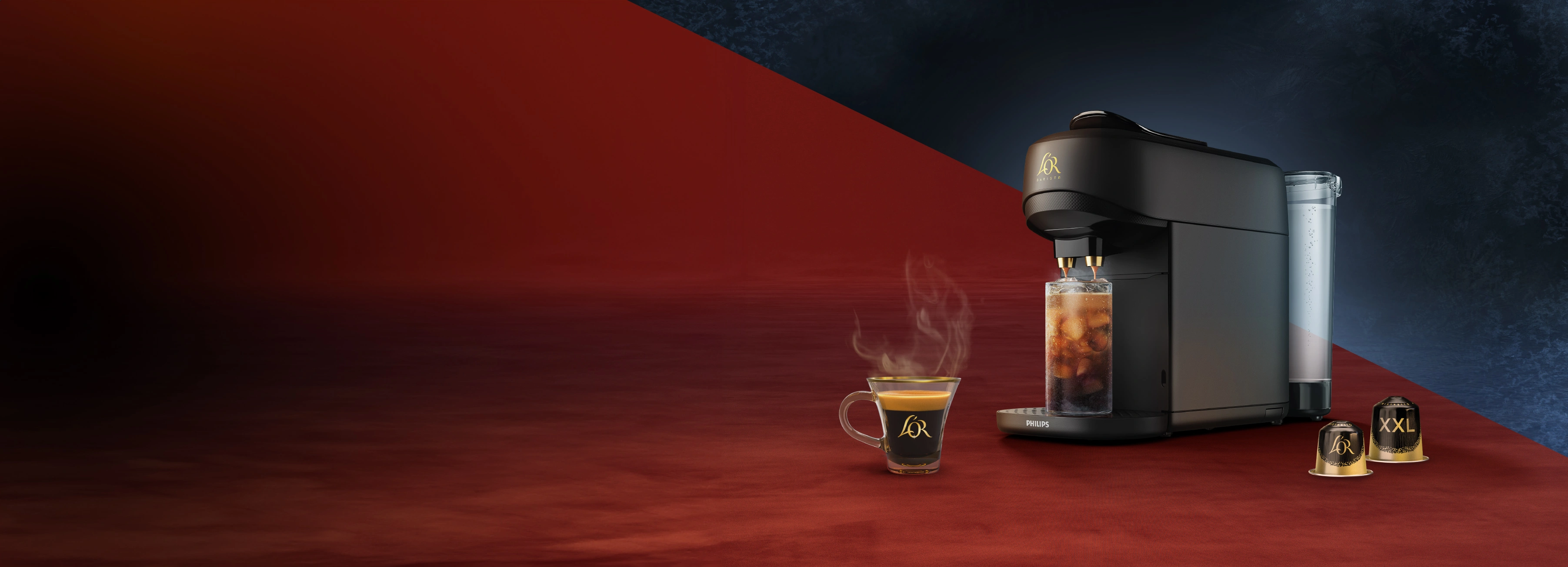 Black L'OR Absolu coffee machine, coffee cup and Ristretto capsules on a wooden table with winter window background.