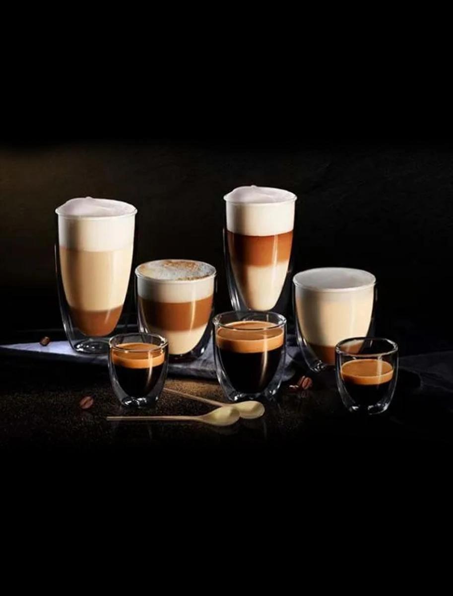 Assorted coffee drinks in clear glasses on a dark background prominently feature L'OR Espresso for an exquisite coffee experience.