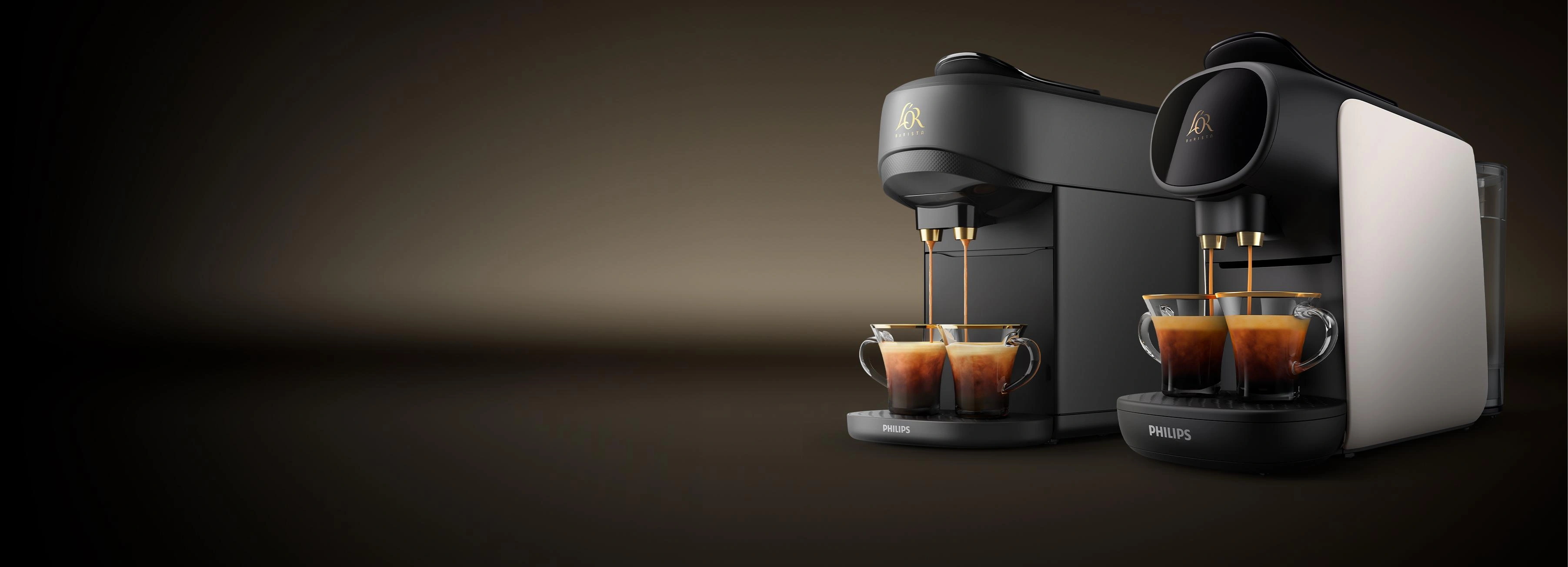 Two L’OR BARISTA coffee machines brewing espressos side by side on a dark gradient background.