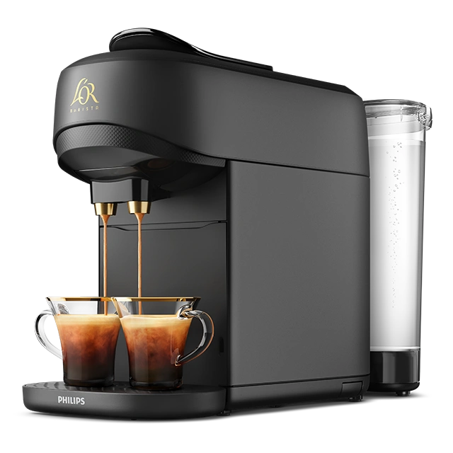 Black L’OR BARISTA Absolu machine with two espressos brewing, water tank visible at the back.