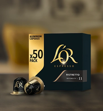 L'OR Barista coffee capsule box containing 50 capsules with two capsules in front.